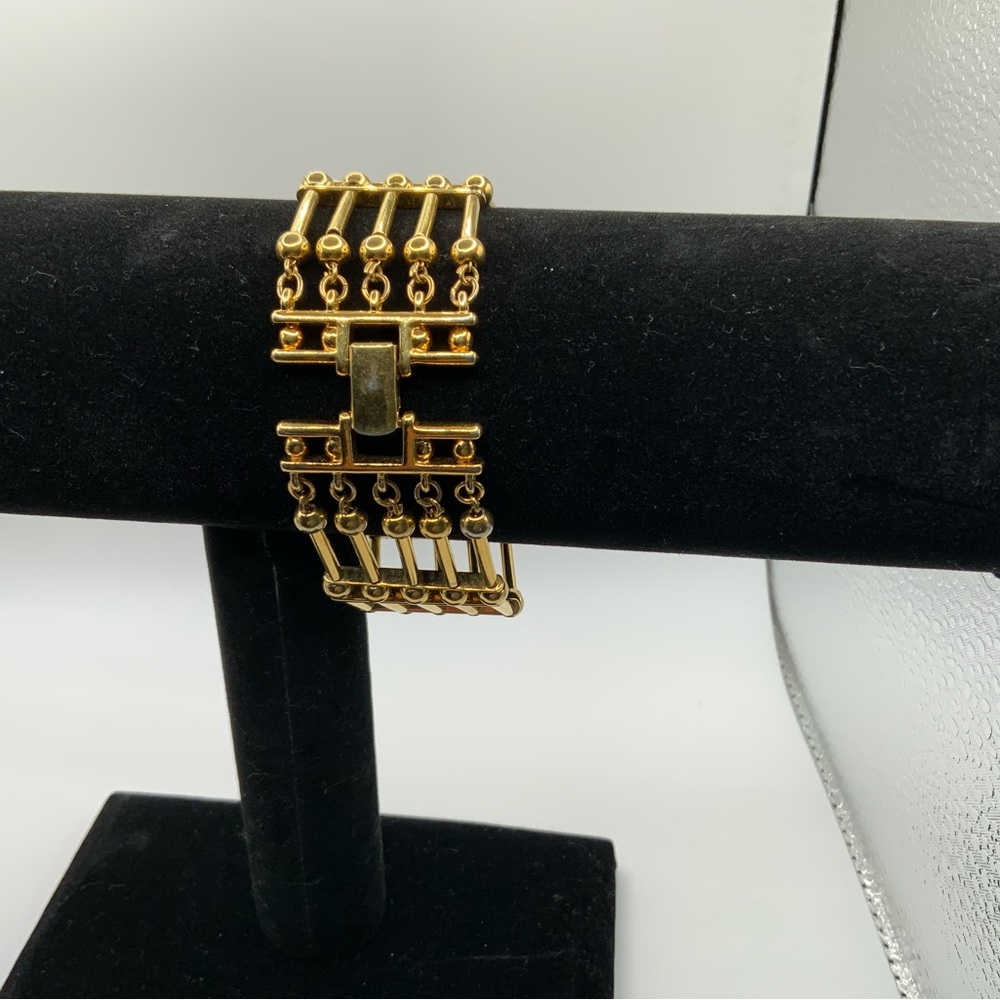 Cute statement bracelet gold tone